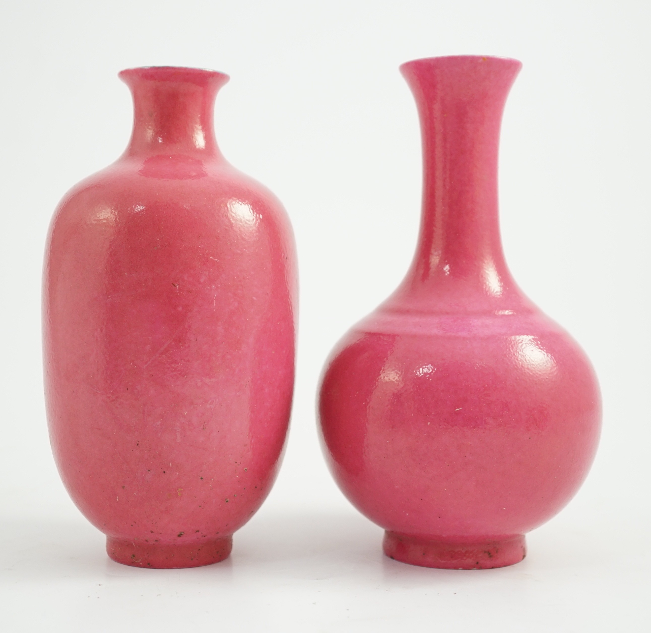 Two Chinese ruby ground vases, possibly Republic period, each with a printed four character Qianlong mark, 18.5 and 19.4cm high
